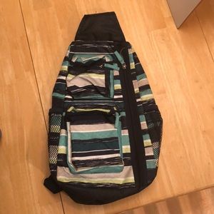 Thirty-One sling back pack.